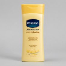 لوسیون بدن وازلین مدل Essential Healing حجم 200 میلی‌لیتر مناسب پوست خشک با ترکیبات گلیسیرین و پارابن و جذب سریع و سبک